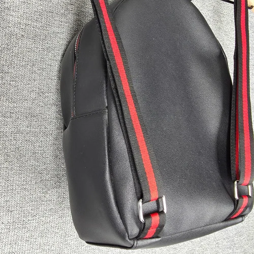 IT CHAPTER TWO PENNYWISE BACKPACK – “TIME TO FLOAT” – BLACK/RED – HOT TOPIC